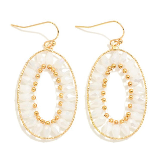 Gold and white earrings